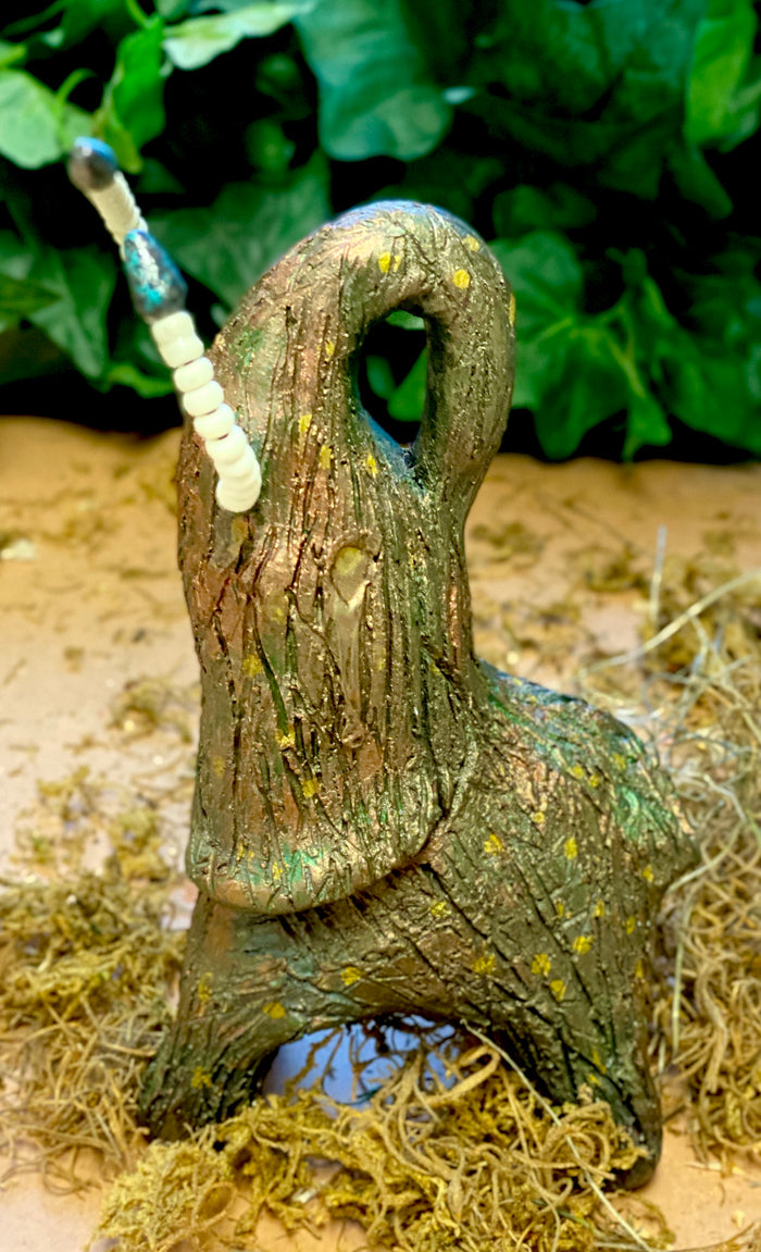 Just one of these lovely Raku Fired Elephant will make an excellent gift for your  friend, sorority or for your home’ special place centerpiece.   7" x 3" x 4" 1 lbs Beautiful metallic raku elephant Beaded tusks For decorative purposely only