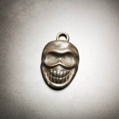 Skull Sītavana Amulet,Smasana Adhipati Pendant,Made of Thokcha - Tibetan Buddhist amulet, close-up detail