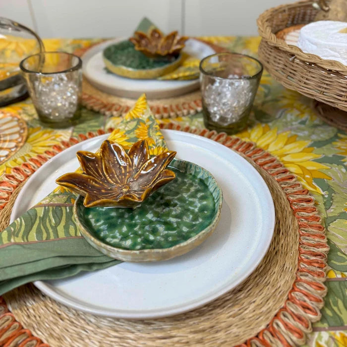 Stoneware flower shaped dish with textured green bowl and brown lotus design