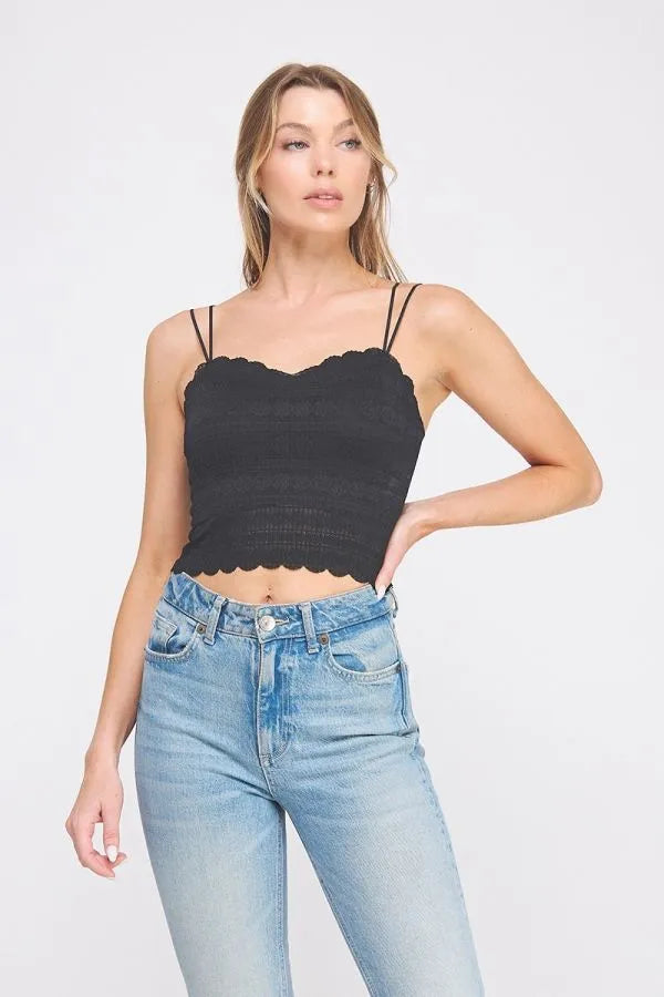 Woman wearing Daisy Lane’s scallop edge bralette with whimsical trim and flirty silhouette